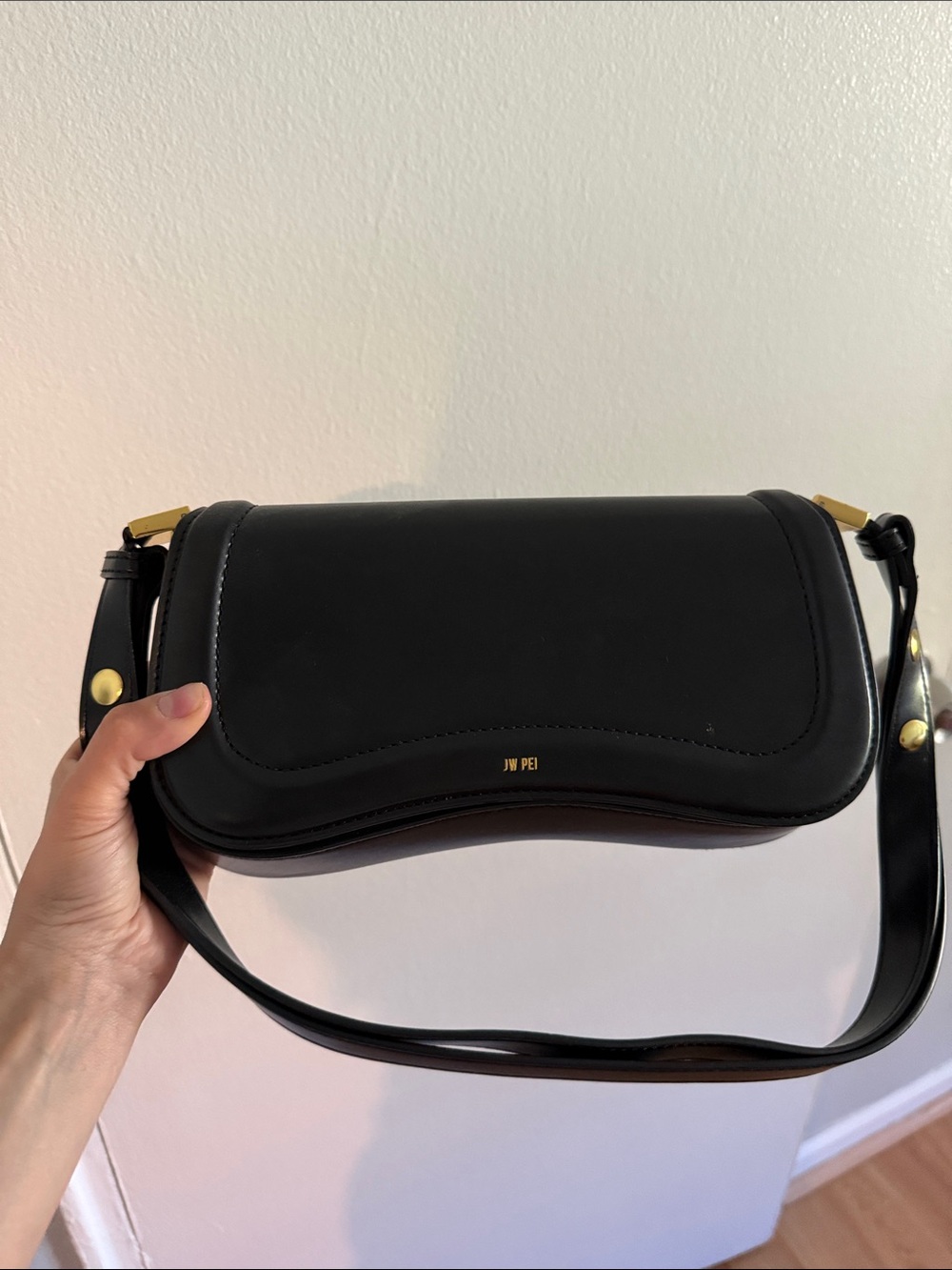 JW PEI Black Vegan Leather Curved Shoulder Bag with Gold Hardware